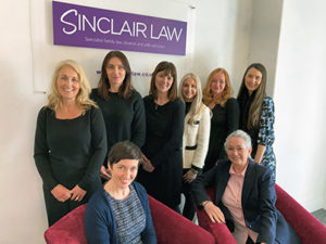 sinclair Law International Women's Day inc signage low res